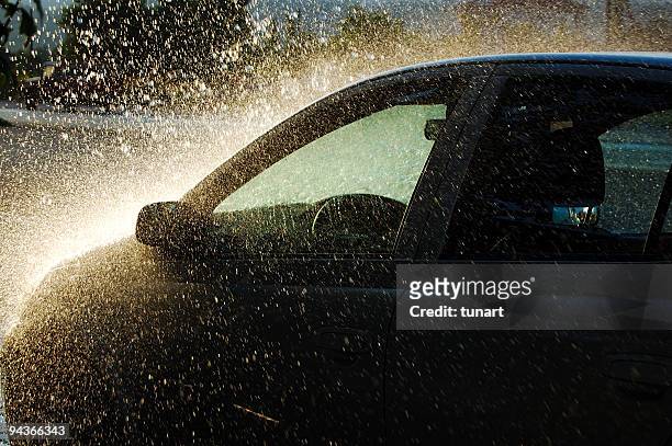 car under heavy rain - torrential rain stock pictures, royalty-free photos & images