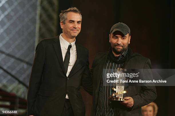 Alfonso Cuaron presents to Nabil Ben Yadir huis award at the Closing Ceremony of the Marrakech 9th Film Festival at the Mansour Hotel - Palais des...