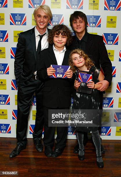Tom Felton, Ramona Marquez, Daniel Roche and Tyger Drew-Honey poses in the press room at the British Comedy Awards on December 12, 2009 in London,...