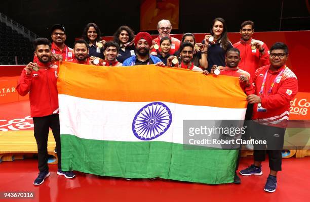 The gold medal table tennis teams of India pose together after the Gold Medal Match at the Table Tennis on day five of the Gold Coast 2018...