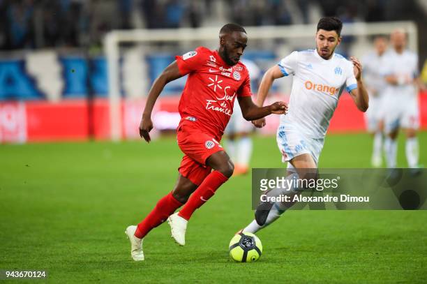 Jonathan Ikone of Montpellier and Morgan Sanson of Marseille during the Ligue 1 match between Olympique Marseille and Montpellier Herault SC at Stade...