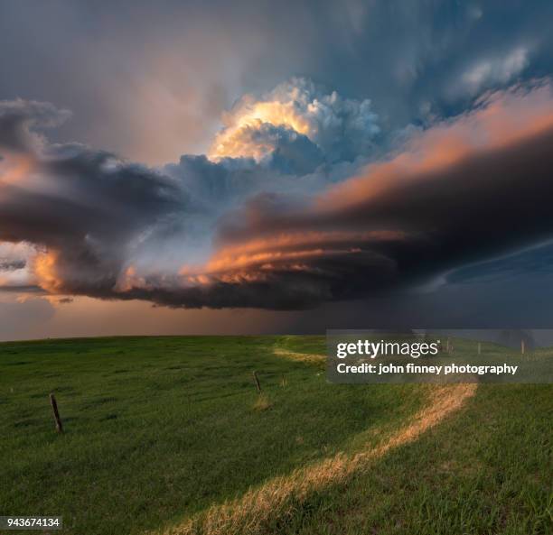 a rotating mesocyclone storm over south dakota at sunset. usa - mammatus cloud stock pictures, royalty-free photos & images