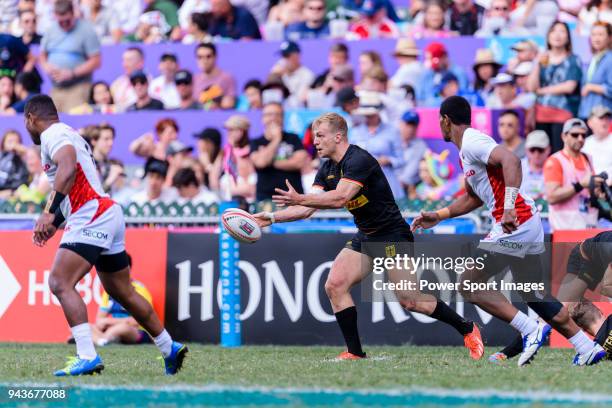 Sebastian Fromm of Germany passes the ball during the HSBC Hong Kong Sevens 2018 Qualification Final match between Germany and Japan on April 8, 2018...