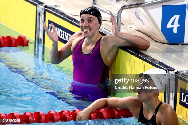 Alys Thomas of Wales celebrates victory in the Women's 200m Butterfly Final on day five of the Gold Coast 2018 Commonwealth Games at Optus Aquatic...