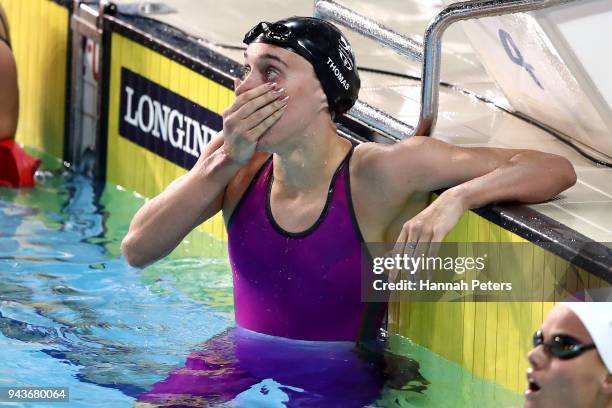 Alys Thomas of Wales celebrates victory in the Women's 200m Butterfly Final on day five of the Gold Coast 2018 Commonwealth Games at Optus Aquatic...
