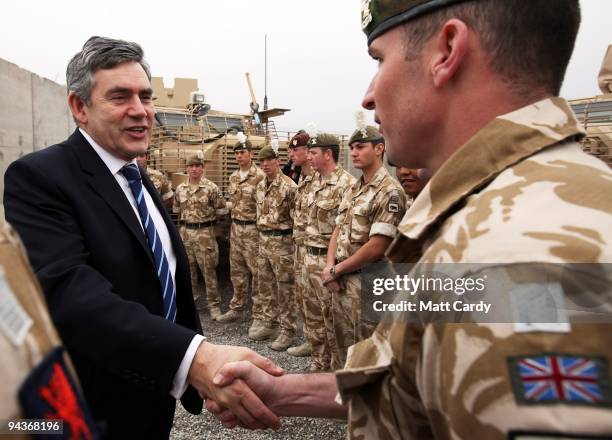 Prime Minister Gordon Brown meets with British troops from 1 Royal Welsh at the Kandahar Airbase on December 13, 2009 in Kandahar, Afghanistan....