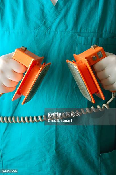 emergency service - defibrillation stock pictures, royalty-free photos & images