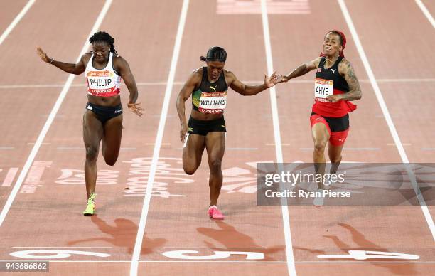 Michelle-Lee Ahye of Trinidad and Tobago wins gold ahead of Christania Williams of Jamaica and Asha Philip of England in the competes in the Women's...