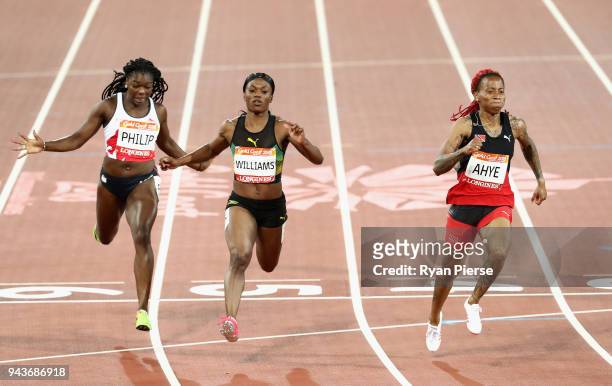 Michelle-Lee Ahye of Trinidad and Tobago wins gold ahead of Christania Williams of Jamaica and Asha Philip of England in the competes in the Women's...