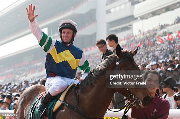 Brett Prebble of Australia riding Hong Kong horse Sacred Kingdom celebrates after winning the Cathay Pacific Hong Kong Sprint race 5 during the...