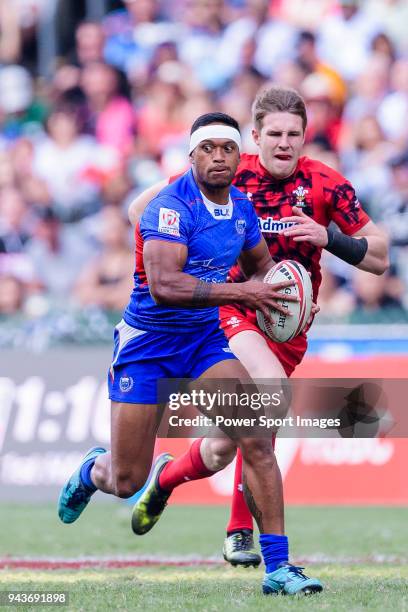 Tomasi Alosio of Samoa runs with the ball during the HSBC Hong Kong Sevens 2018 Shield Final match between Samoa and Wales on April 8, 2018 in Hong...