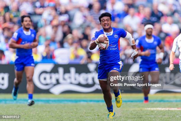 Laaloi Leilua of Samoa runs with the ball during the HSBC Hong Kong Sevens 2018 Shield Final match between Samoa and Wales on April 8, 2018 in Hong...