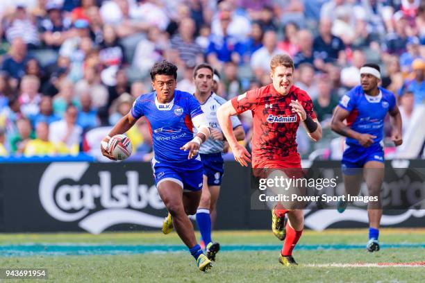 Laaloi Leilua of Samoa runs with the ball during the HSBC Hong Kong Sevens 2018 Shield Final match between Samoa and Wales on April 8, 2018 in Hong...