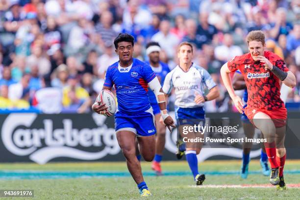 Laaloi Leilua of Samoa runs with the ball during the HSBC Hong Kong Sevens 2018 Shield Final match between Samoa and Wales on April 8, 2018 in Hong...