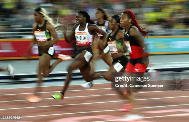 Michelle-Lee Ahye of Trinidad and Tobago races to the line to win gold in the Women's 100 metres final during the Athletics on day five of the Gold...