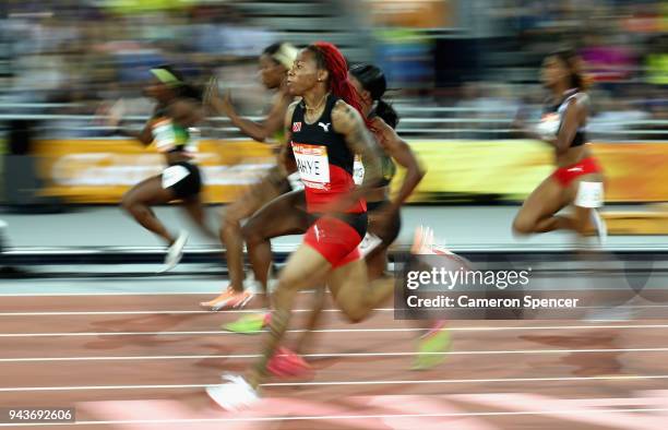 Michelle-Lee Ahye of Trinidad and Tobago races to the line to win gold in the Women's 100 metres final during the Athletics on day five of the Gold...
