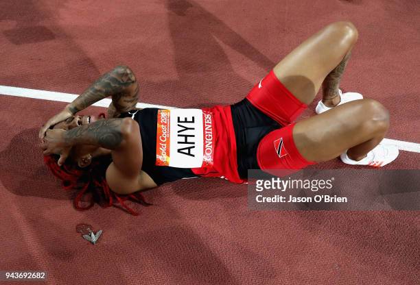 Michelle-Lee Ahye of Trinidad and Tobago celebrates winning gold in the Women's 100 metres final during the Athletics on day five of the Gold Coast...