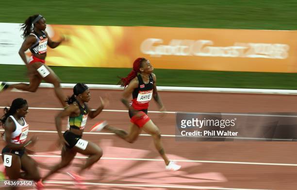 Michelle-Lee Ahye of Trinidad and Tobago races to the line to win gold in the Women's 100 metres final during the Athletics on day five of the Gold...