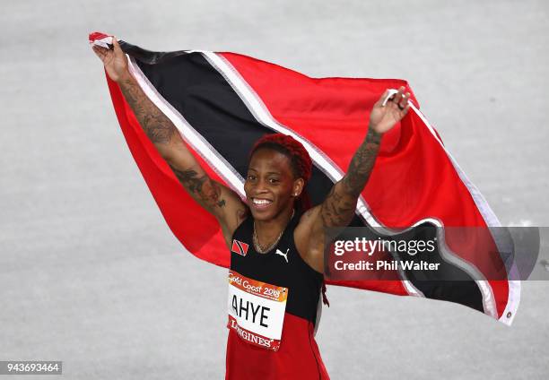 Michelle-Lee Ahye of Trinidad and Tobago celebrates winning gold in the Women's 100 metres final during the Athletics on day five of the Gold Coast...