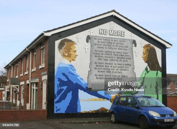 Photo shows a mural promoting peace in east Belfast in Northern Ireland, on March 26, 2018. ==Kyodo