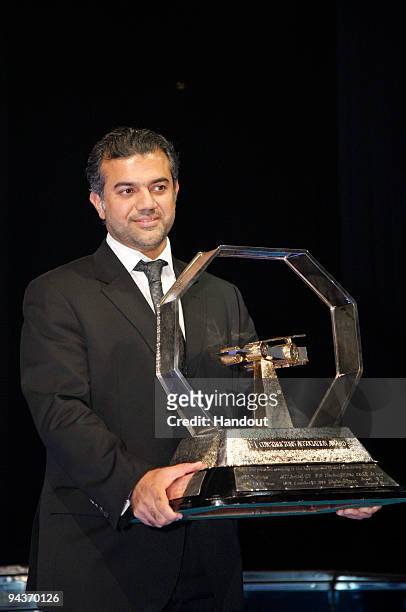 In this handout image provided by FIA, Promoter's Trophy awarded to Abu Dhabi Grand Prix represented by His Excellency Abdulla Khouri during the 2009...
