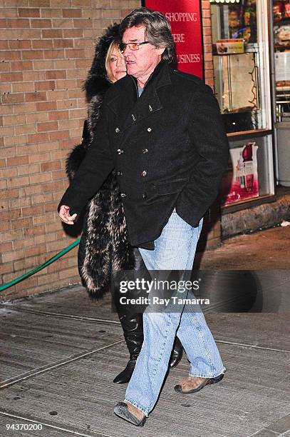 Actors Goldie Hawn and Kurt Russell walk to their Midtown Manhattan home after seeing Catherine Zeta-Jones's performance in "A Little Night Music" on...