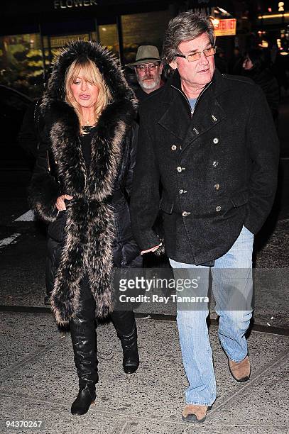 Actors Goldie Hawn and Kurt Russell walk to their Midtown Manhattan home after seeing Catherine Zeta-Jones's performance in "A Little Night Music" on...