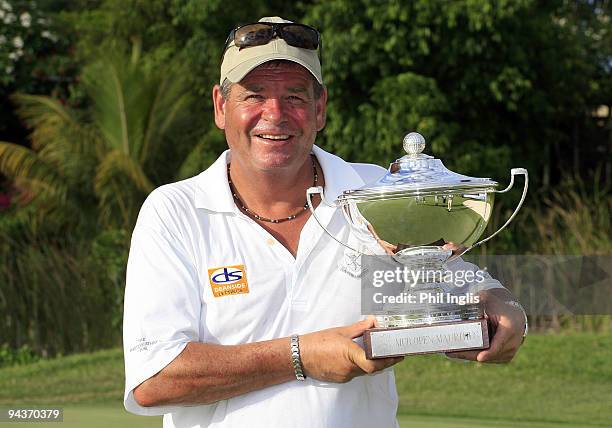 Kevin Spurgeon of England poses with the trophy after round three of the Mauritius Commercial Bank Open played at The Legends Course, Constance Belle...