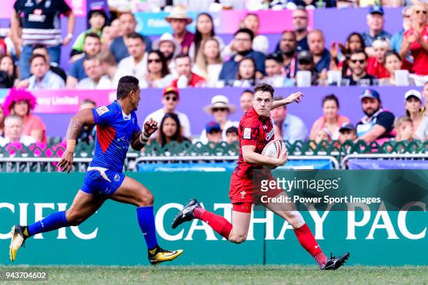 Tomi Lewis of Wales runs with the ball during the HSBC Hong Kong Sevens 2018 Shield Final match between Samoa and Wales on April 8, 2018 in Hong...
