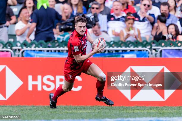 Tomi Lewis of Wales runs with the ball during the HSBC Hong Kong Sevens 2018 Shield Final match between Samoa and Wales on April 8, 2018 in Hong...