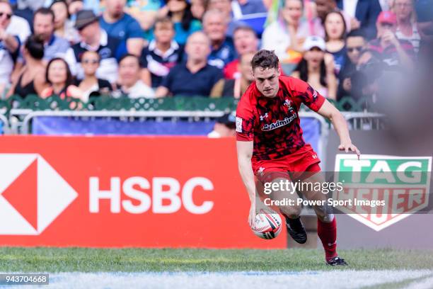 Tomi Lewis of Wales runs with the ball during the HSBC Hong Kong Sevens 2018 Shield Final match between Samoa and Wales on April 8, 2018 in Hong...