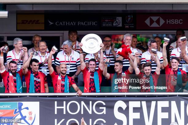 Wales Rugby Squad celebrate with their trophy during the HSBC Hong Kong Sevens 2018 Shield Final match between Samoa and Wales on April 8, 2018 in...