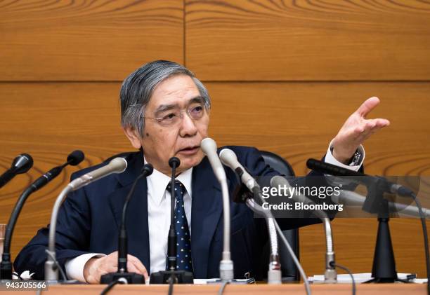 Haruhiko Kuroda, governor of the Bank of Japan , gestures as he speaks during a news conference at the central bank's headquarters in Tokyo, Japan,...