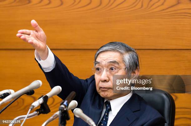 Haruhiko Kuroda, governor of the Bank of Japan , gestures as he speaks during a news conference at the central bank's headquarters in Tokyo, Japan,...