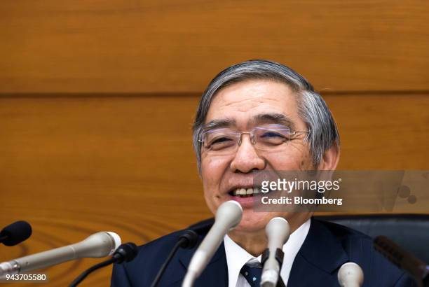 Haruhiko Kuroda, governor of the Bank of Japan , reacts during a news conference at the central bank's headquarters in Tokyo, Japan, on Monday, April...