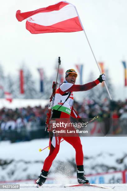 Christoph Sumann of Austria celebrates after winning the Men's 4x7,5 km Relay in the IBU Biathlon World Cup on December 13, 2009 in Hochfilzen,...