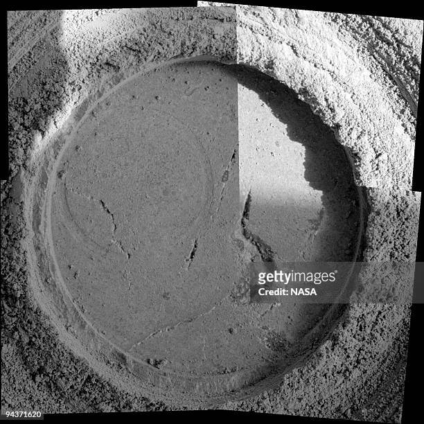 Close-up examination of a freshly exposed area of a rock called "Uchben" in the "Columbia Hills" of Mars reveals an assortment of particle shapes and...