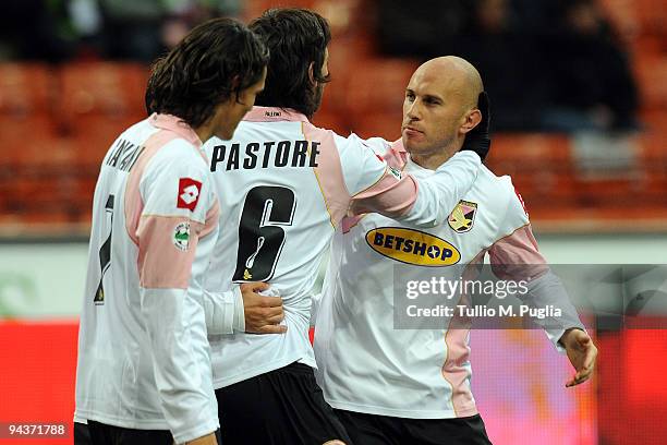 Mark Bresciano of Palermo and his team mates celebrate second goal during the Serie A match between Milan and Palermo at Stadio Giuseppe Meazza on...