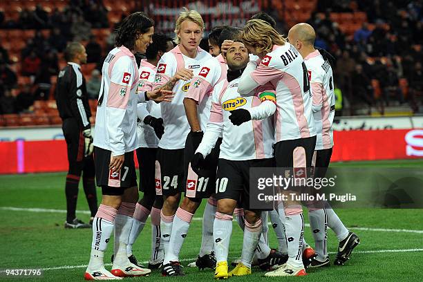 Fabrizio Miccoli of Palermo and his team mates celebrate the opening goal during the Serie A match between AC Milan and US Citta di Palermo at Stadio...