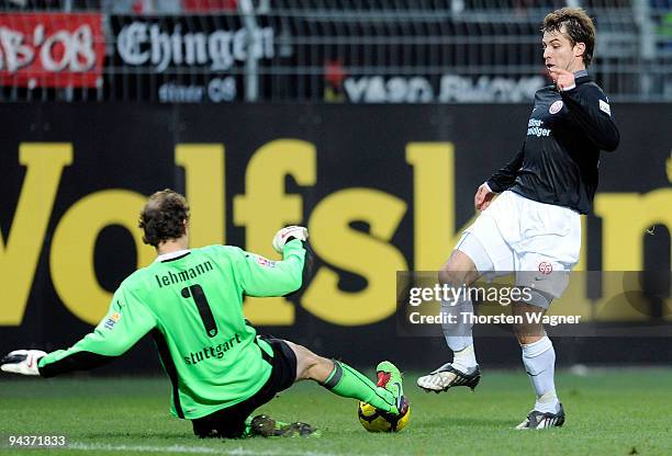 Andreas Ivanschitz of Mainz battles for the ball with Jens Lehmann of Stuttgart during the Bundesliga match between FSV Mainz 05 and VFB Stuttgart at...