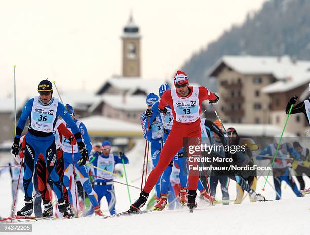 Alexandre Rousselet of France and Thomas Alsgaard of Norway compete during the FIS Cross Country Marathon Cup 'La Sgambeda' on December 13, 2009 in...