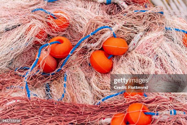 close-up of fishing nets in the harbour of mgarr - island of gozo mgarr stock pictures, royalty-free photos & images