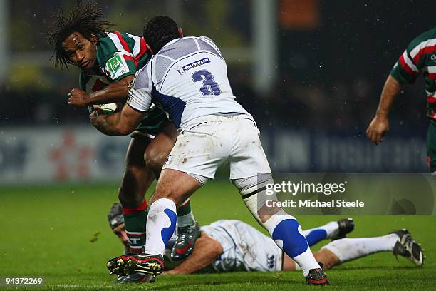 Lote Tuqiri of Leicester is tackled by Jamie Cudmore and Davit Zirakashvili during the ASM Clermont Auvergne v Leicester Tigers Heineken Cup Pool 3...