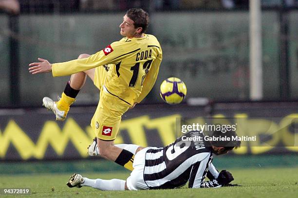 Michele Paolucci of AC Siena in action against Andrea Coda of Udinese Calcio during the Serie A match between Siena and Udinese at Artemio Franchi -...