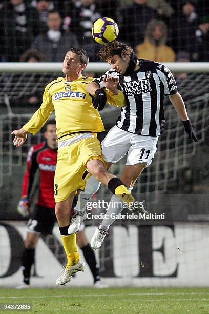 Emanuele Calaio' of AC Siena in action against Andrea Coda of Udinese Calcio during the Serie A match between Siena and Udinese at Artemio Franchi -...