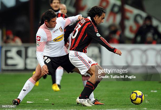 Alessandro Nesta of Milan holds off the challenge from Igor Budan of Palermo during the Serie A match between AC Milan and US Citta di Palermo at...