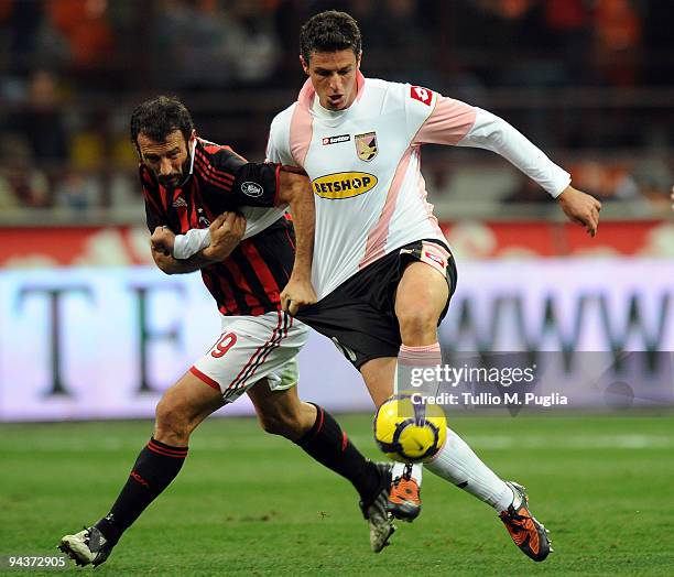 Giuseppe Favalli of Milan and Igor Budan of Palermo battle for the ball during the Serie A match between AC Milan and US Citta di Palermo at Stadio...