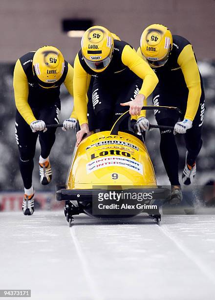 Pilot Edwin van Calker and his team members Arnold van Calkers, Timothy Beck and Arno Klaasen of the Netherlands compete in their first run of the...