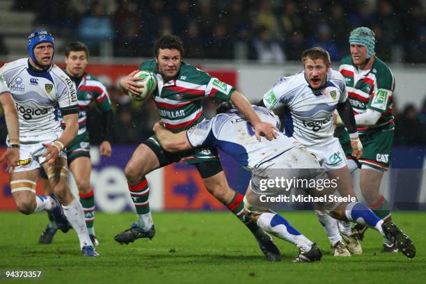 Aaron Mauger of Leicester looks to pass as he is held up by Jamie Cudmore during the ASM Clermont Auvergne v Leicester Tigers Heineken Cup Pool 3...