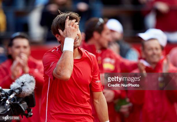 David Ferrer of Spain reacts after his victory in is match against Philipp Kohlschreiber of Germany during day three of the Davis Cup World Group...